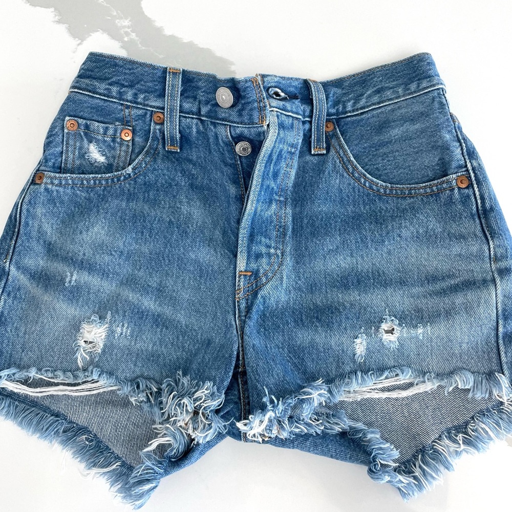 Levi’s 501 highwaisted distressed denim shorts